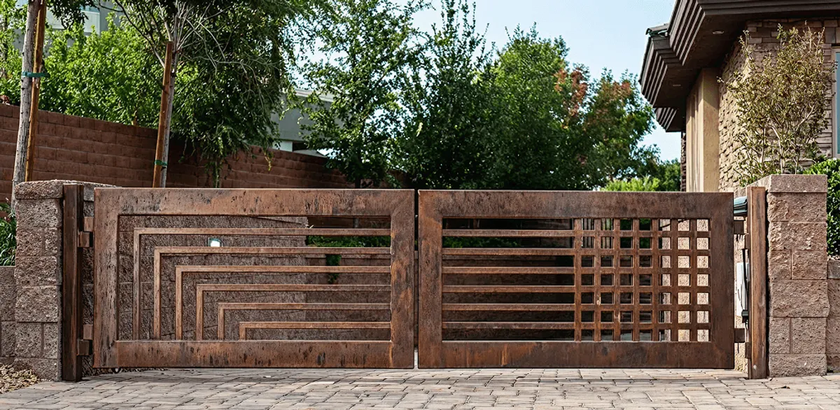 Custom driveway gate installation for a home entrance in Manchester, NH